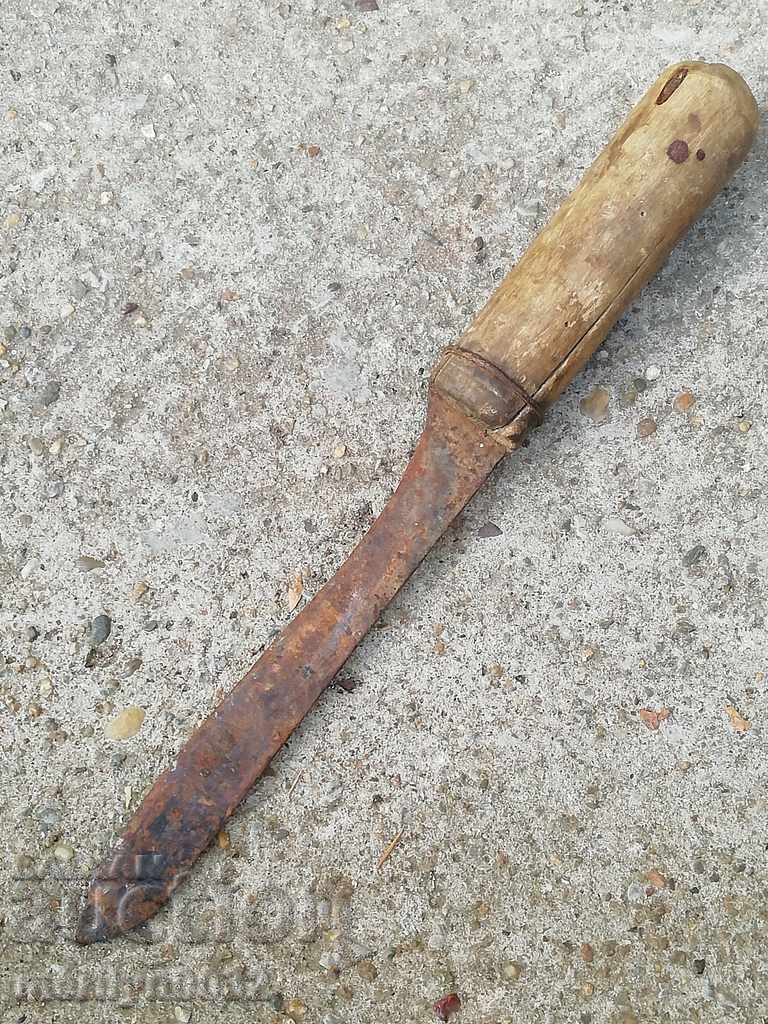 An old knife, the slender blade primitive