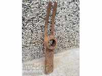 Old agricultural tool, turntable, pick, chap