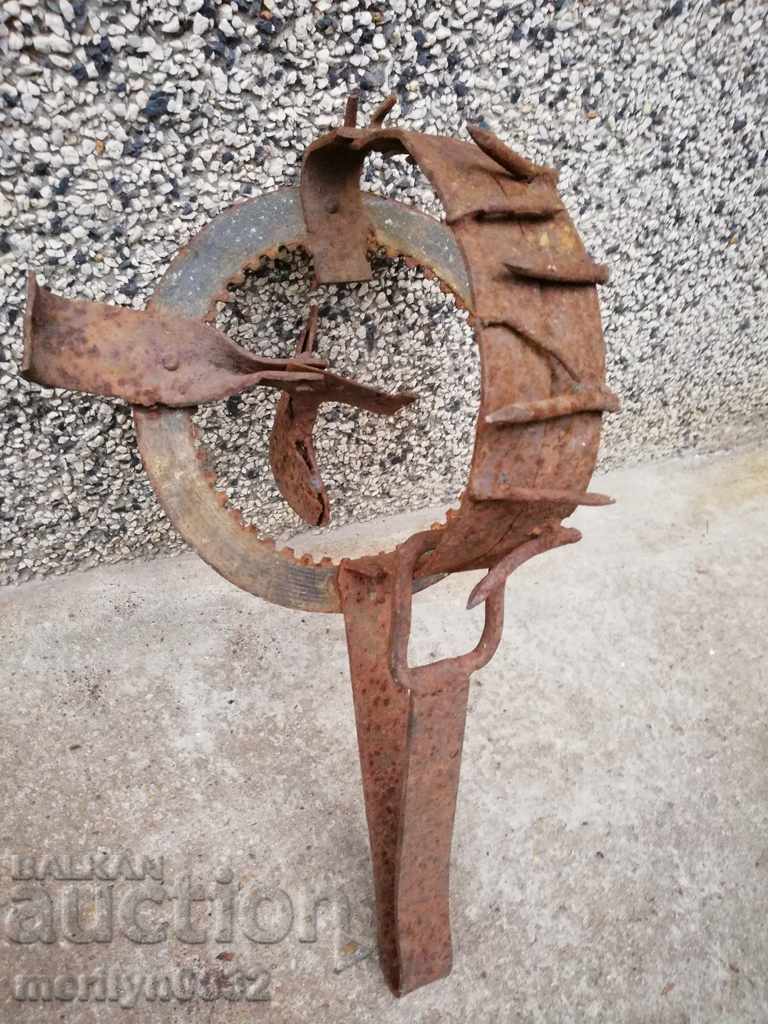 Hand forged trap with wrought iron spikes