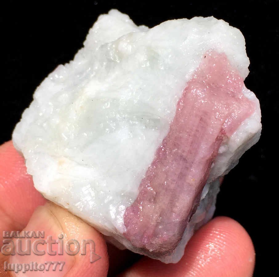pink tourmaline of a mineral matrix