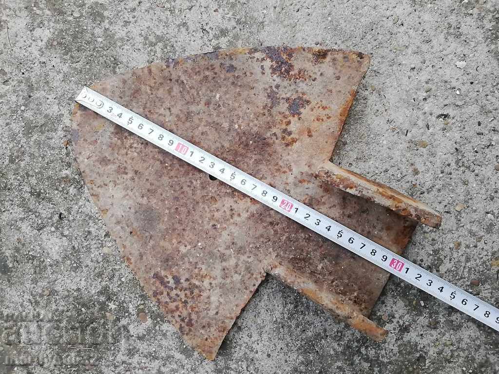 Delivery of Old wagon plow, plow, lump with the Skoda logo Delivery of Old wagon plow, plow, lump with the Skoda logo