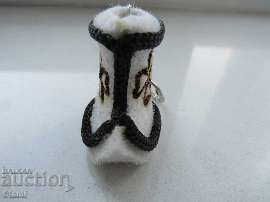 Δημοπρασία Μανγκόλι Μπρελόκ Κουμπί Μπότας