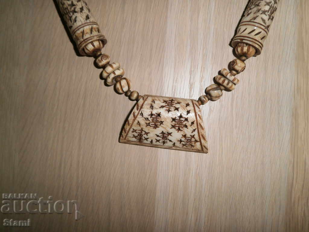 Auction  Grunge necklace of camel bone