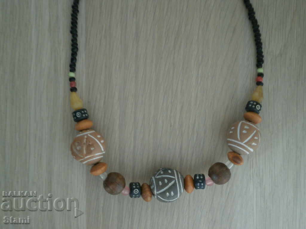 Necklace with African motifs in grunge style-5