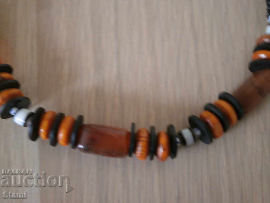 Auction Necklace with African motifs in grunge style-7 Auction Necklace with African motifs in grunge style-7
