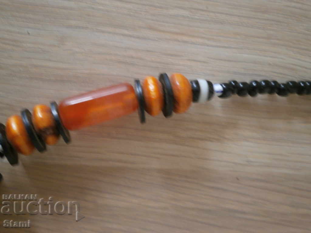 Delivery of Necklace with African motifs in grunge style-7 Delivery of Necklace with African motifs in grunge style-7