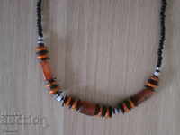 Necklace with African motifs in grunge style-7