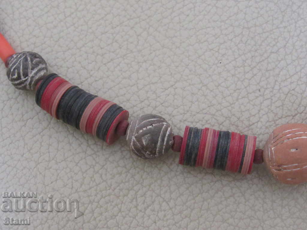 Auction Necklace with African motifs in grunge style-7 Auction Necklace with African motifs in grunge style-7