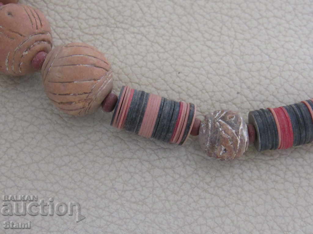 Delivery of Necklace with African motifs in grunge style-7 Delivery of Necklace with African motifs in grunge style-7