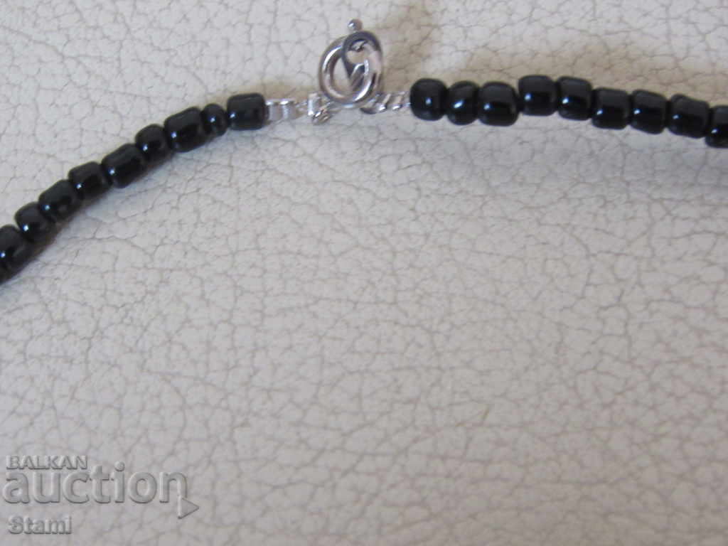 Delivery of Necklace with African motifs in grunge style-9 Delivery of Necklace with African motifs in grunge style-9