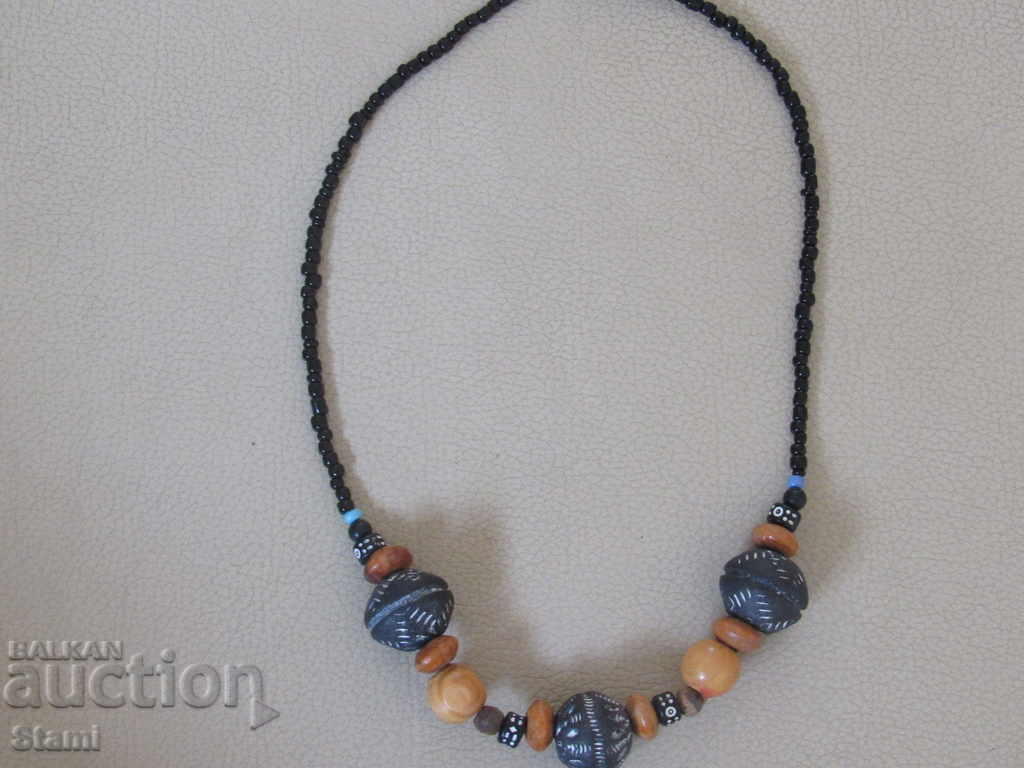 Necklace with African motifs in grunge style-9