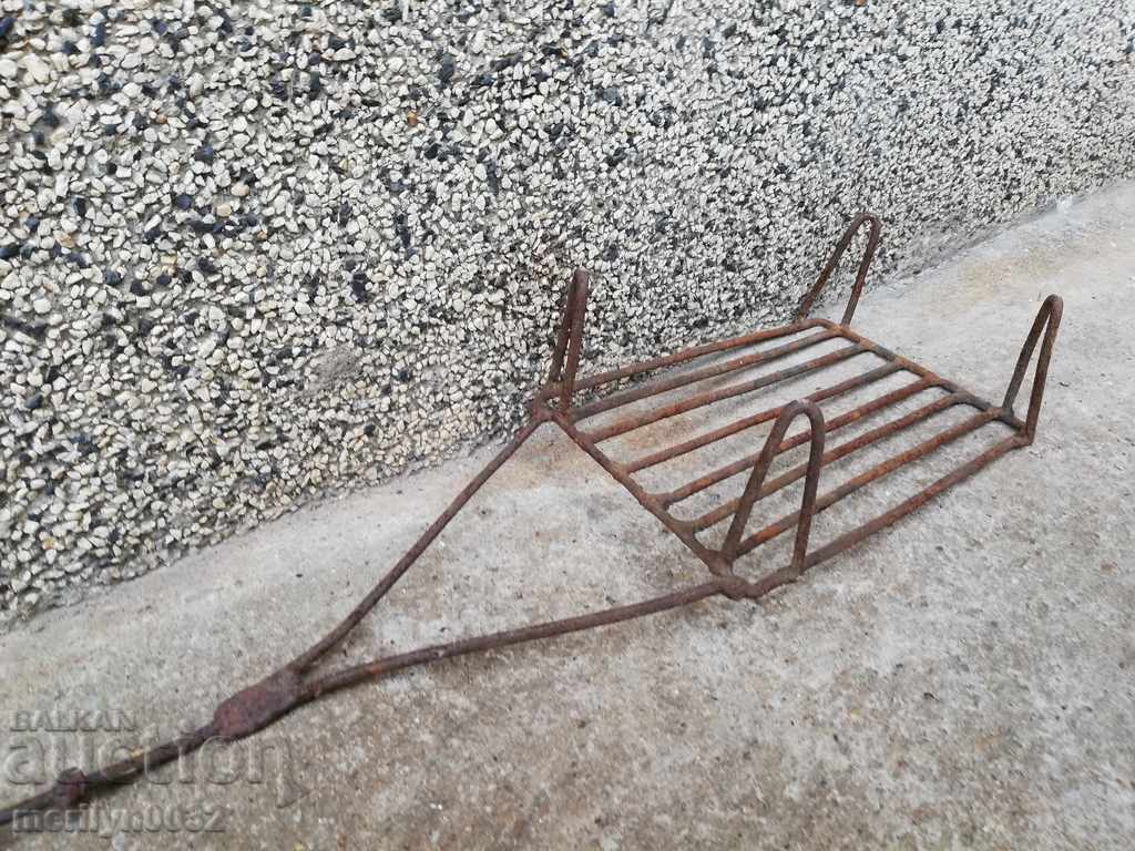 Auction An old hand-forged grill, a steak, wrought iron Auction An old hand-forged grill, a steak, wrought iron