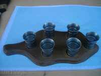 Wooden tray with six small metal cups