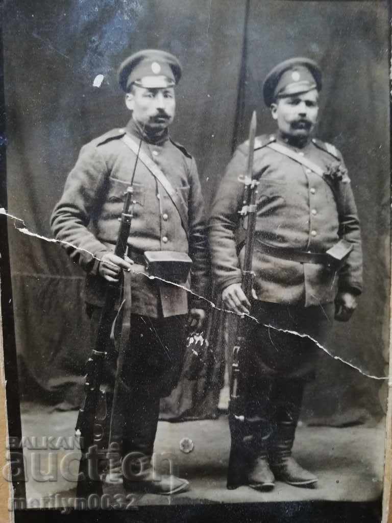 Old photo, photography, portrait of soldiers with rifle