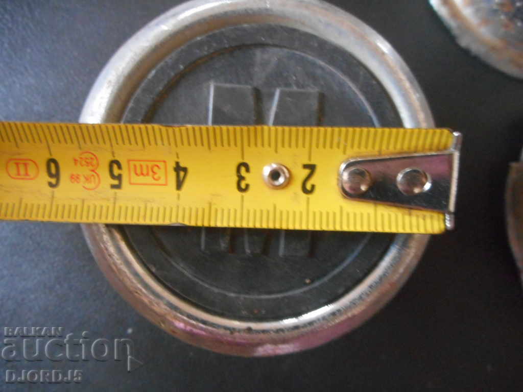 Old caps, emblems from Moskvich car with price 7.00 BGN | € 3.58 Old caps, emblems from Moskvich car with price 7.00 BGN | € 3.58