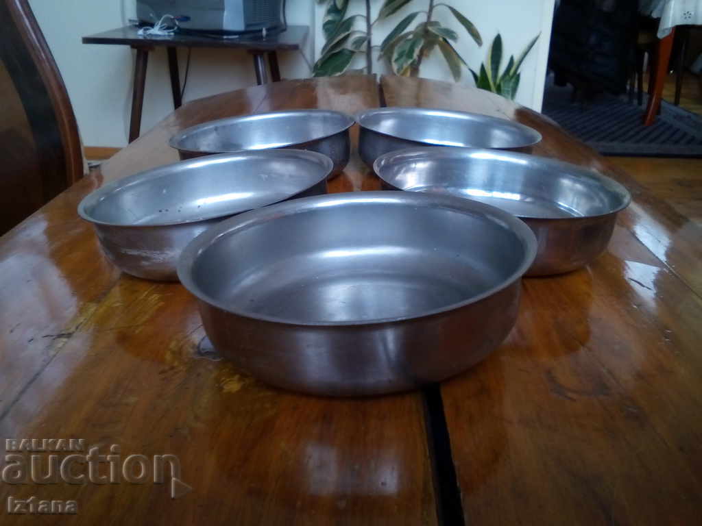 An old metal bowl, bowls