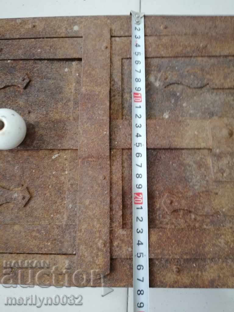 Delivery of An old door from a stove fireplace jam Delivery of An old door from a stove fireplace jam