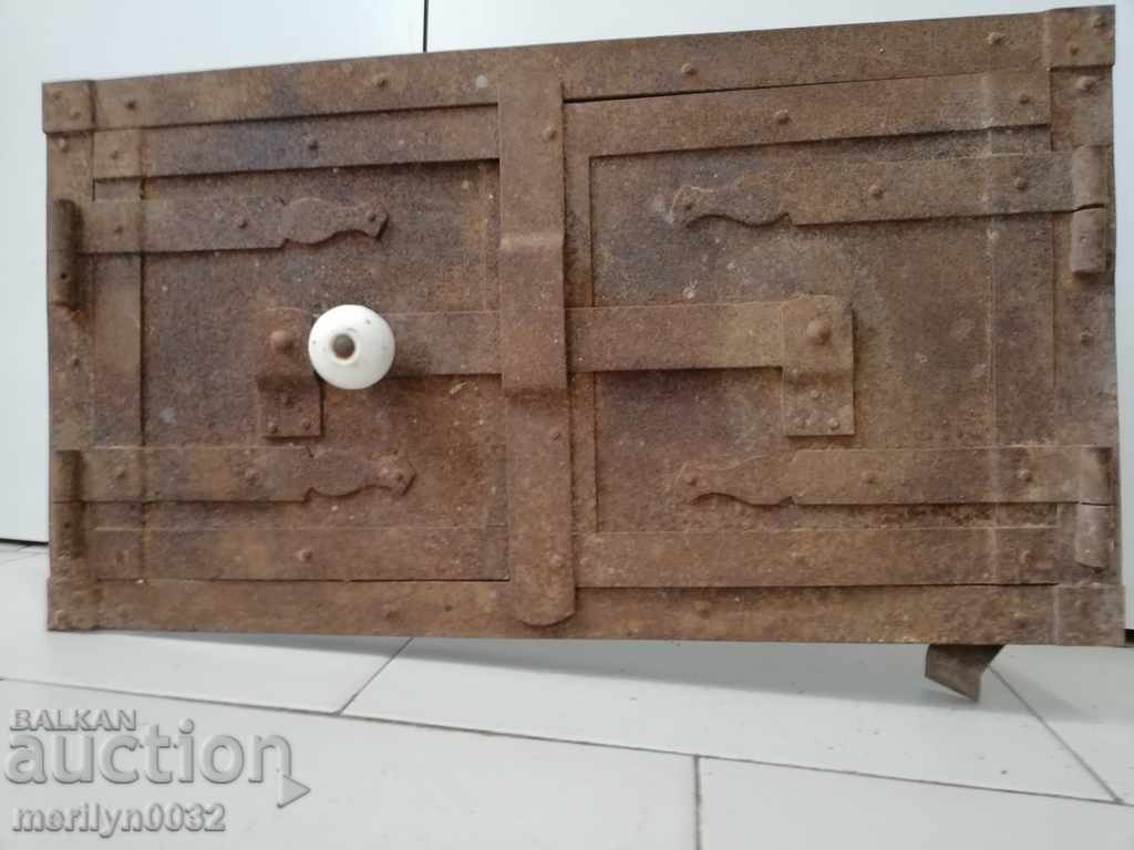 An old door from a stove fireplace jam - 6 An old door from a stove fireplace jam - 6