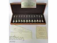 Antique Set of silver spoons.Certificate