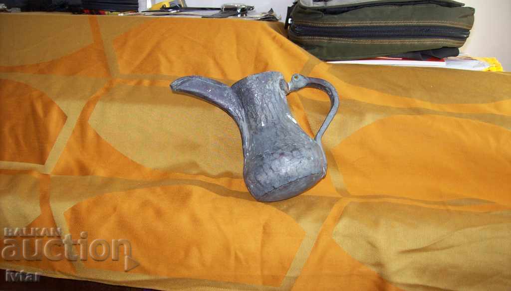 Old copper/bronze/Turkish vessel, cezve, coffee pot Old copper/bronze/Turkish vessel, cezve, coffee pot