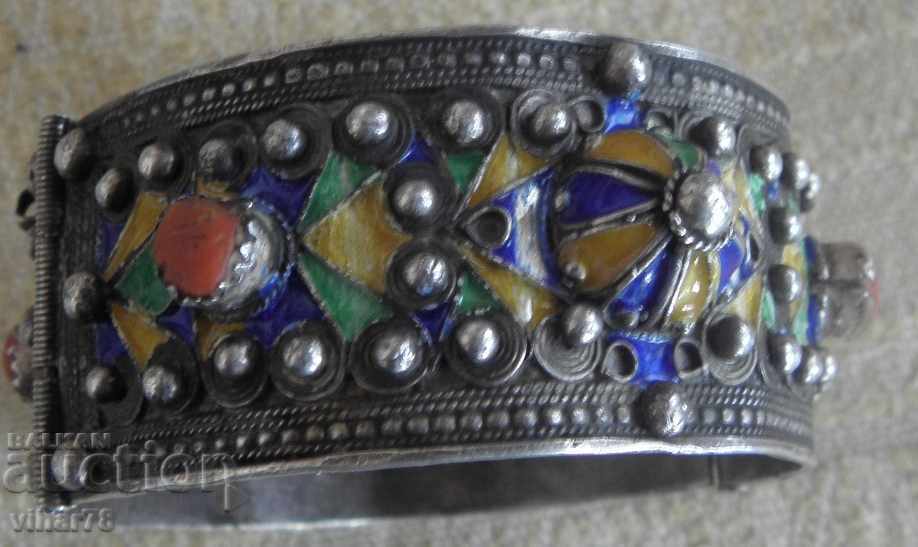 Old silver bracelet with enamel
