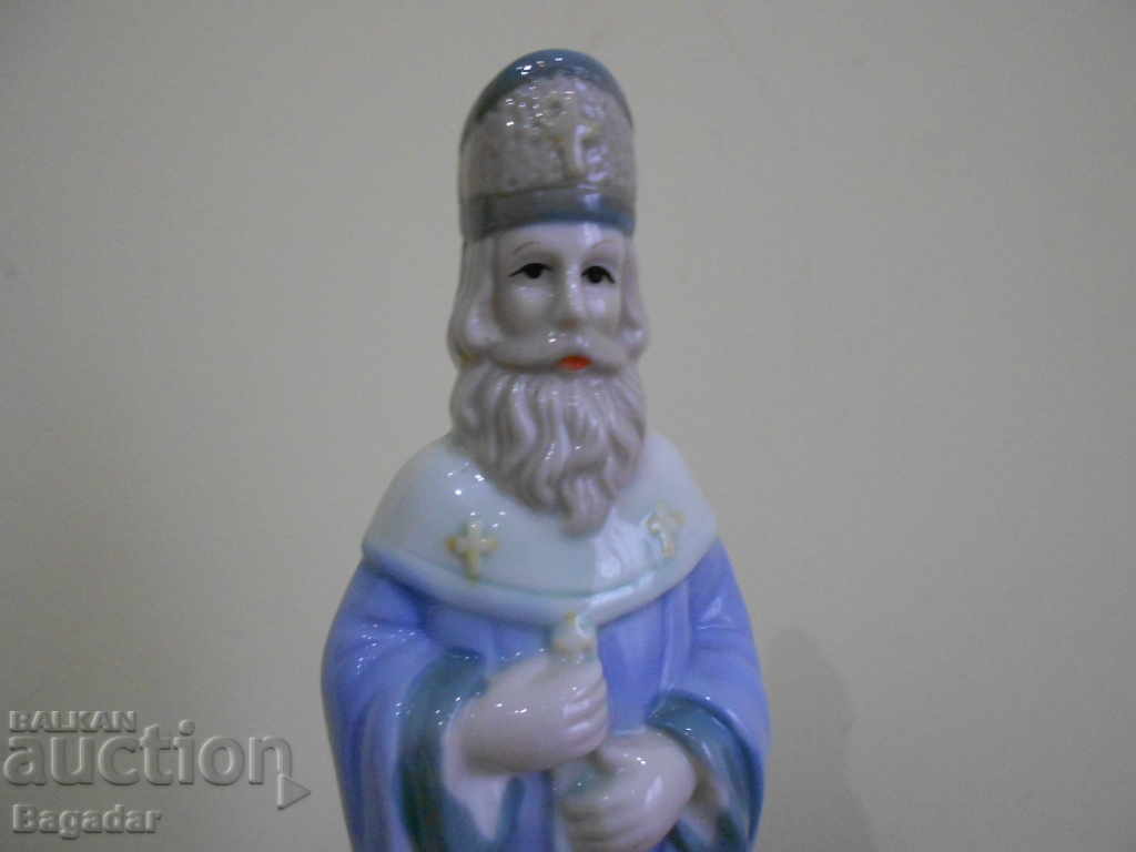 Auction Religious porcelain statuette Auction Religious porcelain statuette