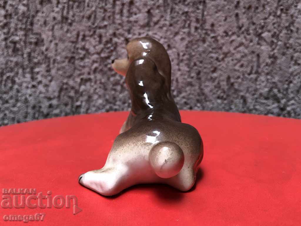 Auction  Porcelain figure of dog / Poodle