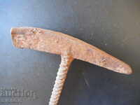 An old craft hammer, an iron handle