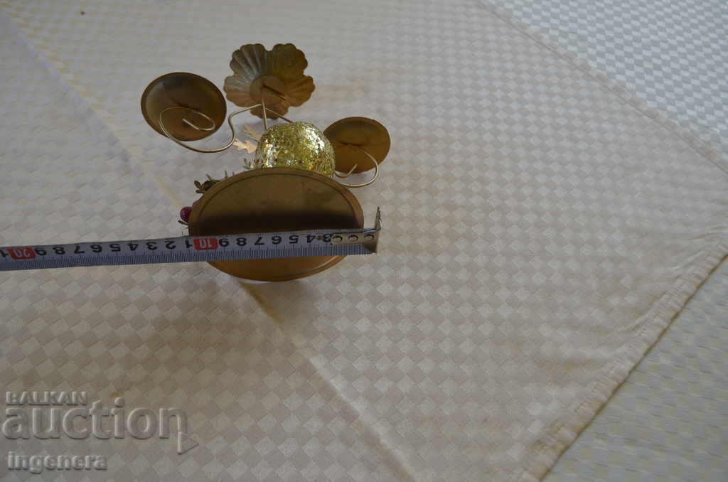 Auction CANDLE, METAL WITH DECORATION Auction CANDLE, METAL WITH DECORATION