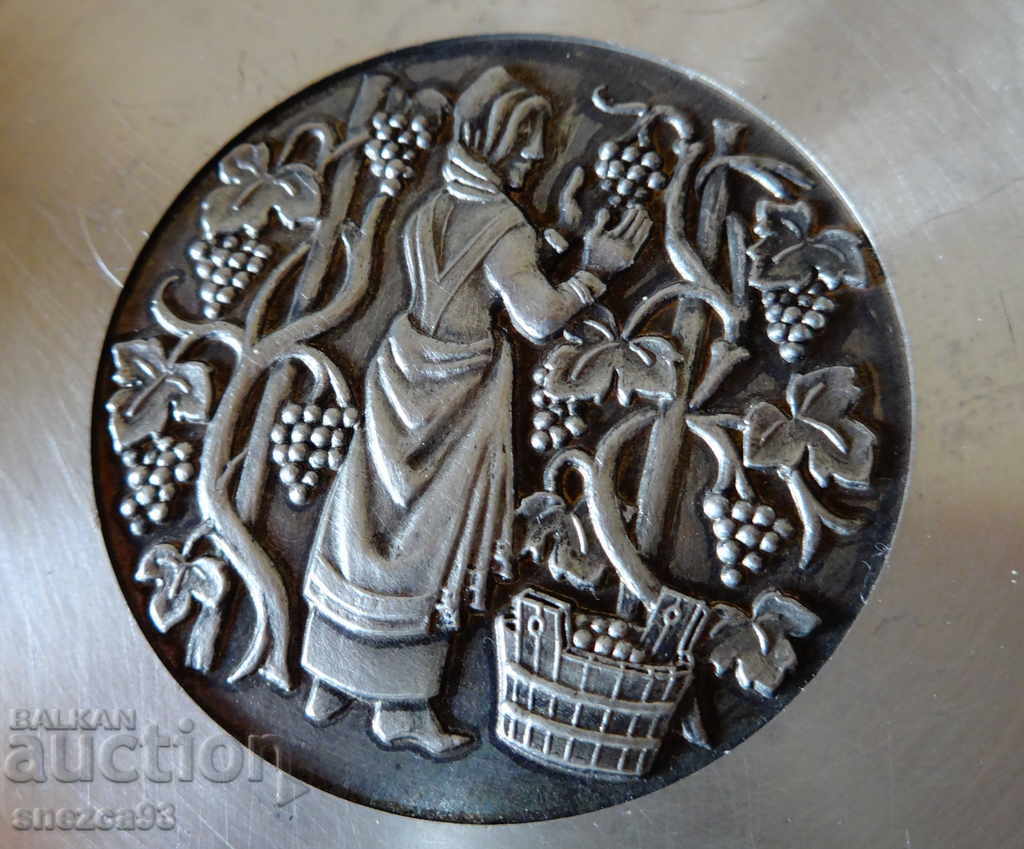 Auction  Pewter plate with embossed image Harvest, 2 pieces