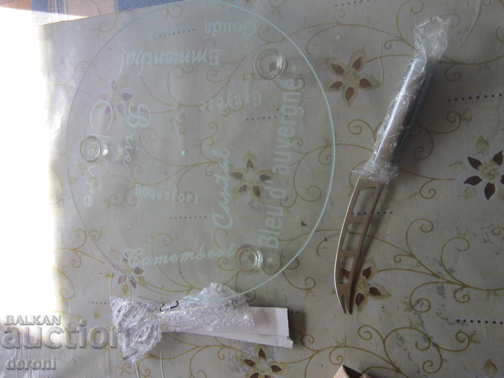 Delivery of German platter for serving cheese with a knife Delivery of German platter for serving cheese with a knife