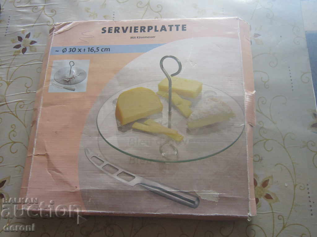 German platter for serving cheese with a knife