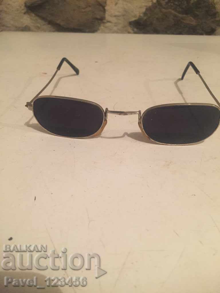 Old sunglasses like John Lennon