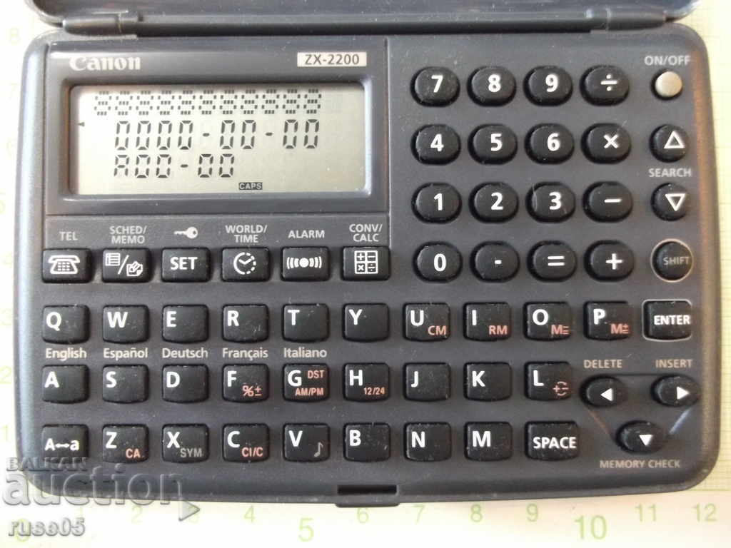 Delivery of Organizer '' CANON - ZX - 2200 '' working Delivery of Organizer '' CANON - ZX - 2200 '' working