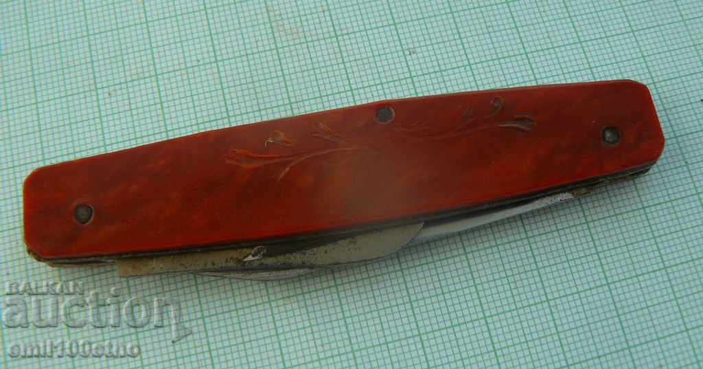 Foldable pocket travel knife with USSR opener
