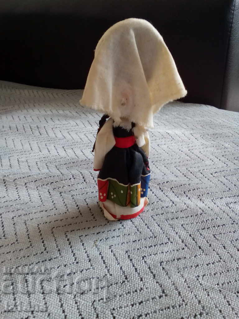 Auction An old folk figurine, a souvenir Auction An old folk figurine, a souvenir