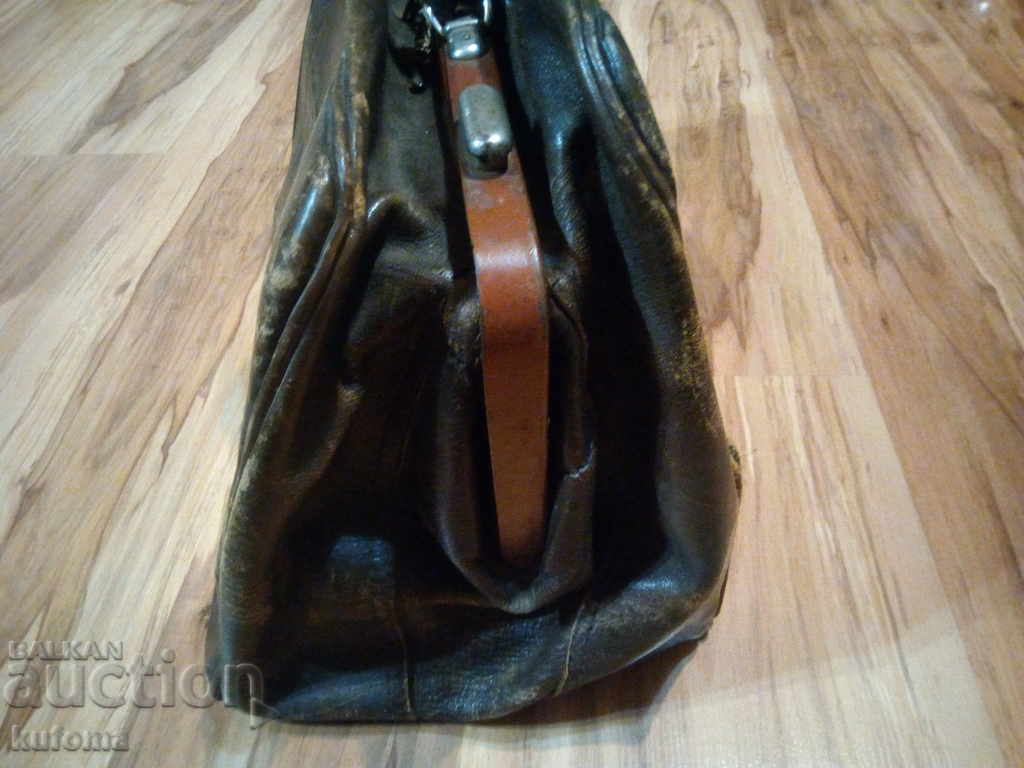 Auction Very old antique leather suitcase Auction Very old antique leather suitcase