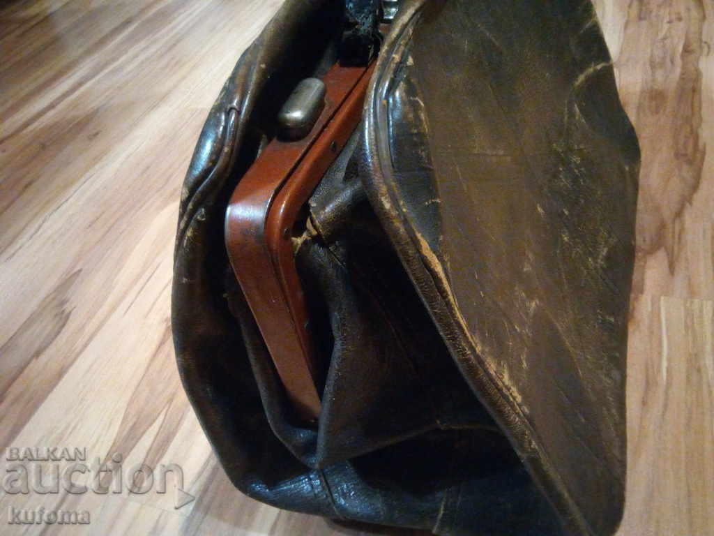 Delivery of Very old antique leather suitcase Delivery of Very old antique leather suitcase