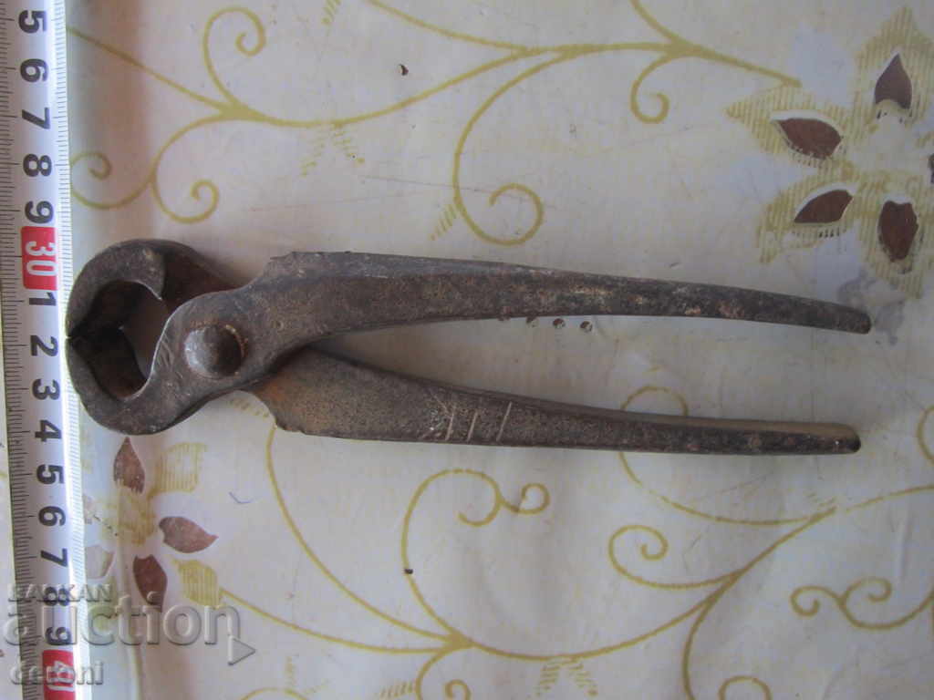 Old German small tongs with serrated with price 10.00 BGN | € 5.11