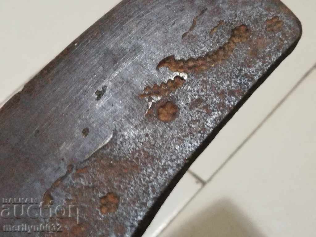 Delivery of An old ax shaft tool wrought iron Delivery of An old ax shaft tool wrought iron