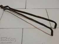 Old dilaf, tongs, wrought iron for oven