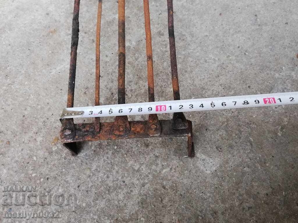 An old hand-forged grill, a steak, wrought iron - 5 An old hand-forged grill, a steak, wrought iron - 5