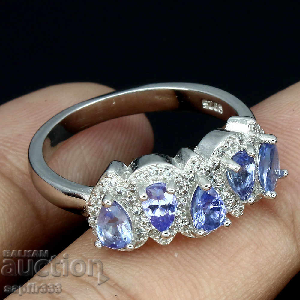 Auction  LUXURY RING WITH NATURAL TANZANITES