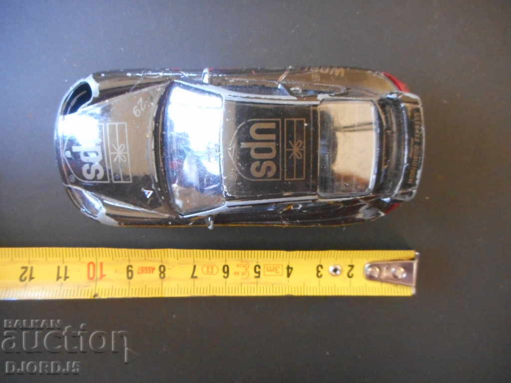 PORSCHE Carrera 911, metal pedestal with price 4.00 BGN | € 2.05 PORSCHE Carrera 911, metal pedestal with price 4.00 BGN | € 2.05