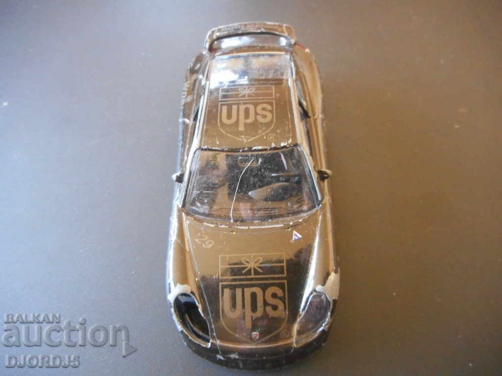 Auction PORSCHE Carrera 911, metal pedestal Auction PORSCHE Carrera 911, metal pedestal