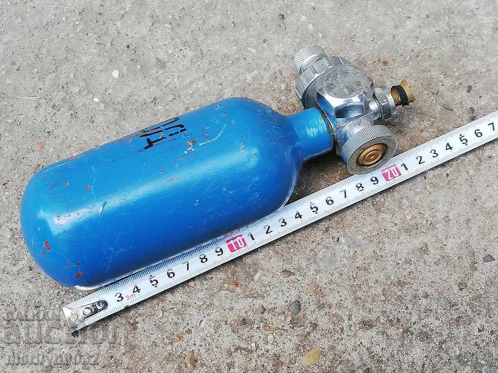 Auction An old little oxygen bottle Auction An old little oxygen bottle