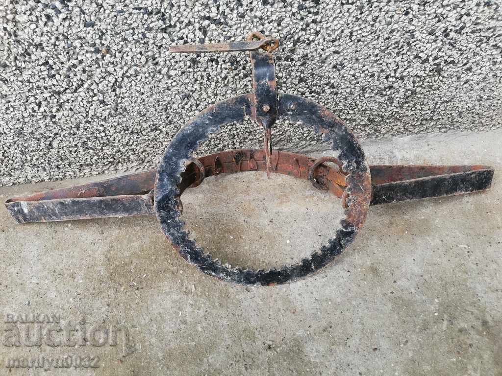 Auction Old hand forged trap with wrought iron spikes Auction Old hand forged trap with wrought iron spikes