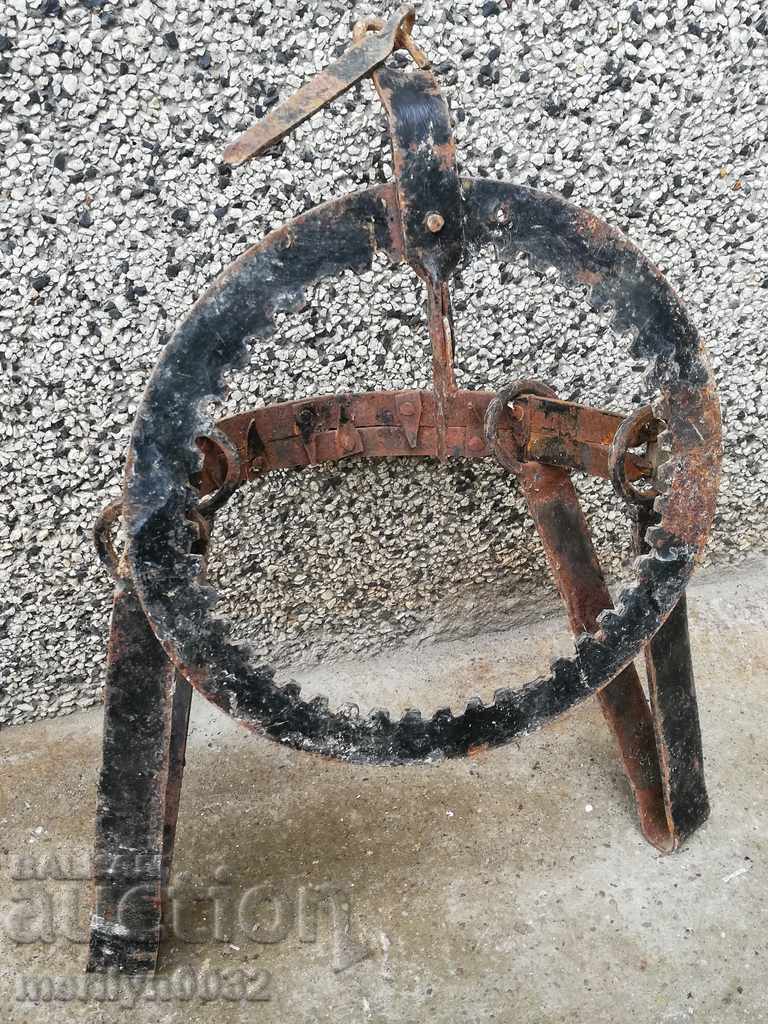 Delivery of Old hand forged trap with wrought iron spikes Delivery of Old hand forged trap with wrought iron spikes
