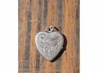 an old silver heart for a photo silver pendant jewel