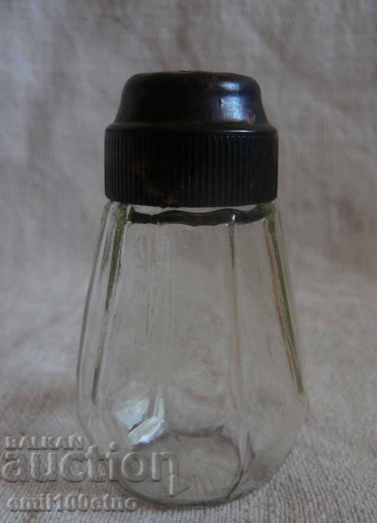 Стара стъклена солница с бакелитена капачка